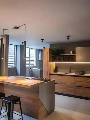 a kitchen with a wooden counter and a kitchen island at Condado 204 - Eco Apt/Natural Atmosphere in El Poblado