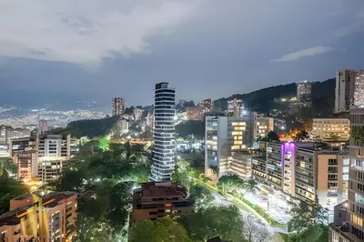 a rendering of a skyscraper in a city at night at Energy 1603 - Modern Design & Prime Location/ AC in El Poblado