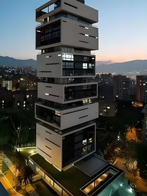 a rendering of a tall building at night at Energy 1603 - Modern Design & Prime Location/ AC in El Poblado