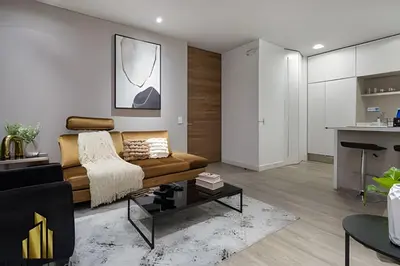 a living room with a couch and a table at Energy 1603 - Modern Design & Prime Location/ AC in El Poblado