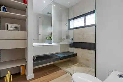 a bathroom with a sink and a toilet at Energy 403 - Prestigious Urban Oasis / Pool in El Poblado