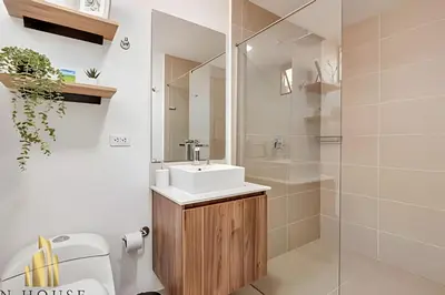 a bathroom with a sink and a shower at Kyux 405 - The Icon of Exclusivity in Laureles in Alpujarra