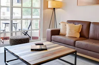a living room with a couch and a coffee table at La 70 Laureles 302 - Fresh & Well Apt/Priv balcony in Guayaquil