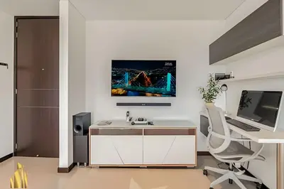 a white office with a desk and a computer at Life 1202 - Pleasant Apt in Poblado with AC in El Poblado