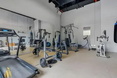 a gym with a bunch of exercise bikes in it at Life 1603 - Panoramic & Tastefully Decorated Loft in El Poblado