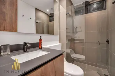 a bathroom with a sink and a toilet and a shower at Morph 1001 - Exclusive apt in Poblado/BBQ in El Poblado