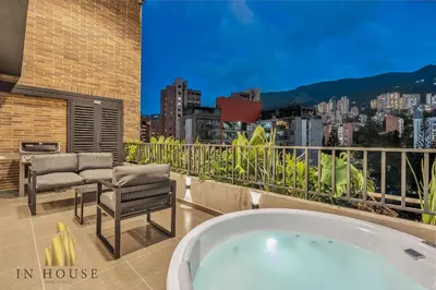 a bath tub sitting on top of a balcony at Morph 1001 - Exclusive apt in Poblado/BBQ in El Poblado