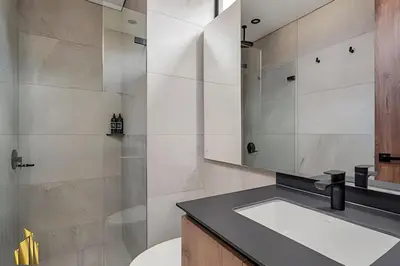 a bathroom with a sink and a shower at Morph 1101 - Sophisticated & brigh apt/ BBQ in El Poblado