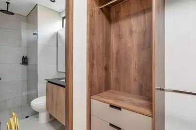 a bathroom with a toilet and a shower at Morph 1101 - Sophisticated & brigh apt/ BBQ in El Poblado