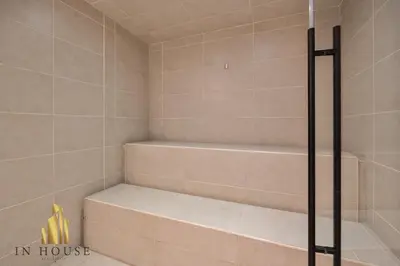 a walk in shower with a staircase in a bathroom at Morph 1202 - Stylish City Living: Modern Apt in El Poblado