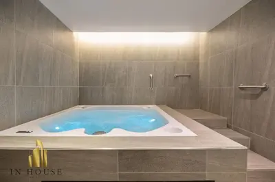 a jacuzzi tub in a bathroom at Morph 1301 - Chill Haven BBQ, Jacuzzi, AC in El Poblado