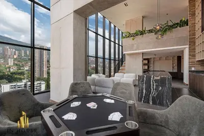 a room with a hot tub in a building with windows at Morph 1401 - Luxe & bright ap in Poblado with AC in El Poblado