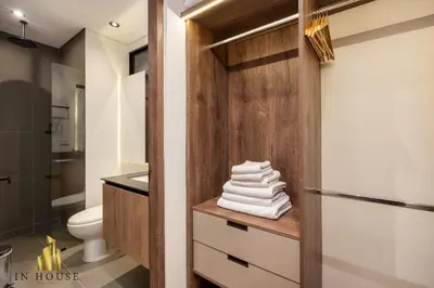 a bathroom with a sink and a toilet at Morph 1501 - Vibrant apt in Poblado/AC/Jacuzzi/BBQ in El Poblado