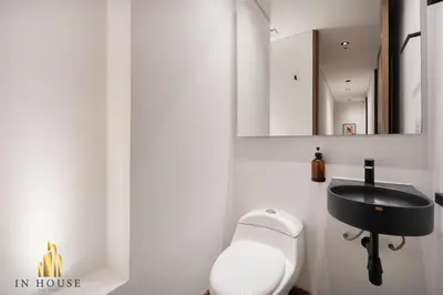 a bathroom with a toilet and a sink at Morph 1501 - Vibrant apt in Poblado/AC/Jacuzzi/BBQ in El Poblado