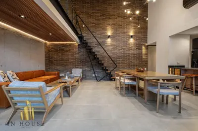 a living room with a couch and a table at Morph 1601 - Exclusivity in Poblado/Jacuzzi in El Poblado