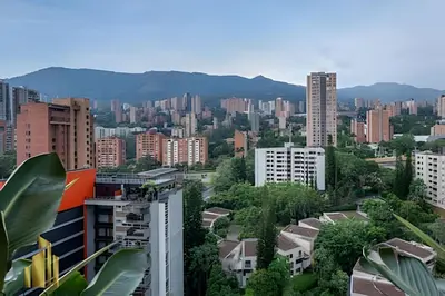 a view of a city with buildings and trees at Morph 1601 - Exclusivity in Poblado/Jacuzzi in El Poblado