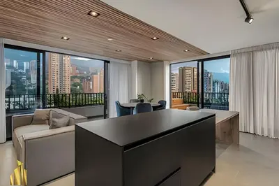 a living room with a couch and a table at Morph 1602 - Luxury escape in Poblado/Jacuzzi/AC in El Poblado