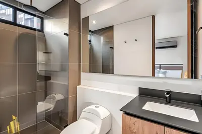 a bathroom with a sink and a mirror at Morph 1802 - Stylish Escape in Poblado AC/Jacuzzi in El Poblado