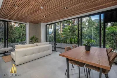 a living room with a couch and a table at Morph 301 - Fresh Air Retreat in Poblado/AC in El Poblado