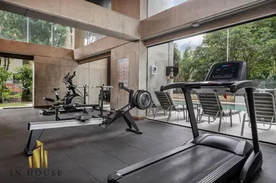 a gym with two exercise bikes and a treadmill at Morph 301 - Fresh Air Retreat in Poblado/AC in El Poblado