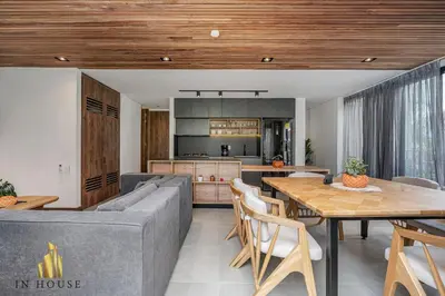 a living room with a couch and a table at Morph 501 - Spacious Cozy Apt Poblado/BBQ/Jacuzzi in El Poblado