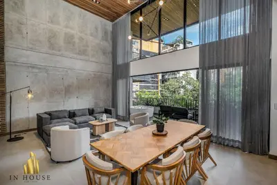 a dining room with a table and chairs at Morph 502 - Bright & Spacious, Poblado/BBQ/Jacuzzi in El Poblado