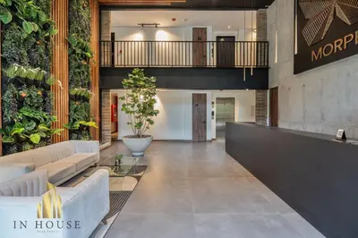 a lobby of a house with plants on the wall at Morph 502 - Bright & Spacious, Poblado/BBQ/Jacuzzi in El Poblado