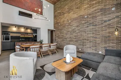a living room with a couch and a table at Morph 502 - Bright & Spacious, Poblado/BBQ/Jacuzzi in El Poblado