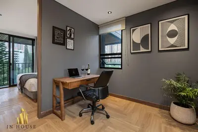 an office with a desk and a chair in a room at Morph 902 - Luxury Apt in Poblado with Balcony in El Poblado