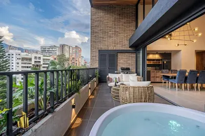 a hot tub on a balcony with a view at Morph 902 - Luxury Apt in Poblado with Balcony in El Poblado