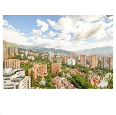 an aerial view of a city with tall buildings at Beautiful apartment in Poblado in Medellín