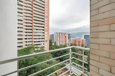 a balcony with a view of the city at Next Avenue 702 - Apt with balcony and AC/Poblado in El Poblado