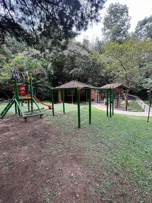 a park with a playground with a swing set at Poblado Del Campestre 203 - Comfort & Exclusivity in Envigado