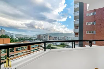 a balcony with a view of the city at Poblado Sandiego 1505 - Cool off in style apt/pool in El Salvador