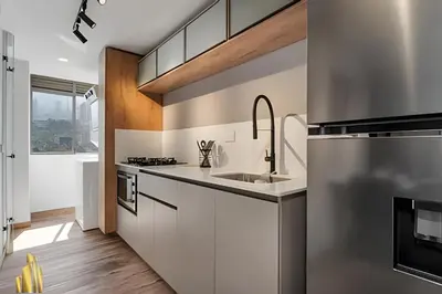 a kitchen with a sink and a stove at Portal de los Parra 1604 - Peaceful apt/Balcony in El Poblado