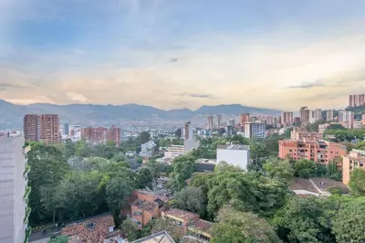 a view of a city with buildings and trees at Provenza Life 1003 - Airy Loft with abundant light in El Poblado