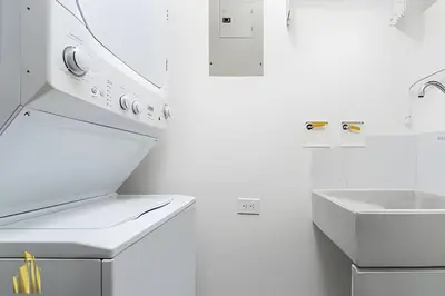 a white kitchen with a sink and a sink at Provenza Life 703 - Secure/bright apt/priv balcony in El Poblado