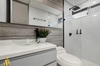 a bathroom with a bowl sink and a toilet at Provenza Life 903 - Modern/cozy living in Provenza in El Poblado