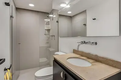 a bathroom with a sink and a toilet at San Angel 205-Familiar & Trendy apt near Provenza in El Poblado
