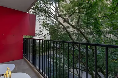 a balcony with a view of a tree at Santacoloma 407 Apto tranquilo con vistas verdes. AC in El Poblado