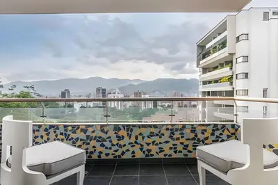 a balcony with a view of a city at Santiago De Bagatela 1104 - Spacious apt Poblado in Envigado