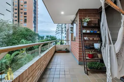 a balcony with plants on a building at Santiago De Bagatela 401 - Serene apt/sauna & gym in Envigado