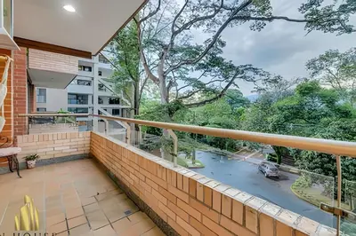 a balcony with a view of the street at Santiago De Bagatela 401 - Serene apt/sauna & gym in Envigado
