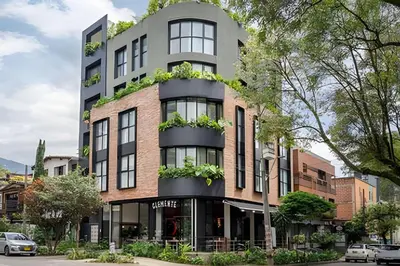 a building with plants on the side of it at Solei Loft 201 - Luxe Stay in El Poblado in El Poblado