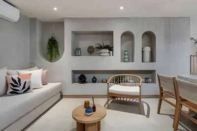 a living room with a couch and a chair at Solei Loft 302 - Elegant Oasis: Loft/Jacuzzi/AC in El Poblado