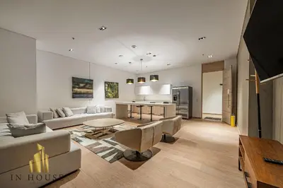 a living room with a couch and a table at Urban 2005 - Serenity AC retreat: Soft decoration in El Poblado