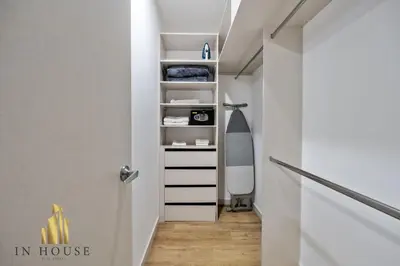 a hallway with a door leading into a room at Urban 2005 - Serenity AC retreat: Soft decoration in El Poblado