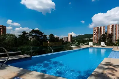 a swimming pool on top of a building at Urbano2205-Serenidad y fitness. Apt- piscina/gym in El Poblado