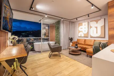 a living room with a couch and a table at Urban 2505 - Oasis with pool and gym in El Poblado