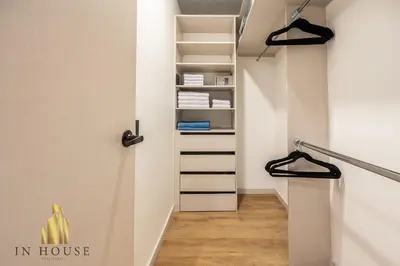 a staircase in a room with a book shelf at Urban 2505 - Oasis with pool and gym in El Poblado
